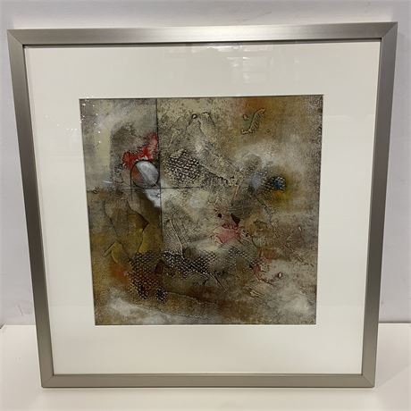 Framed brown, gray, red and black abstract art print with a white mat and a chrome metal frame