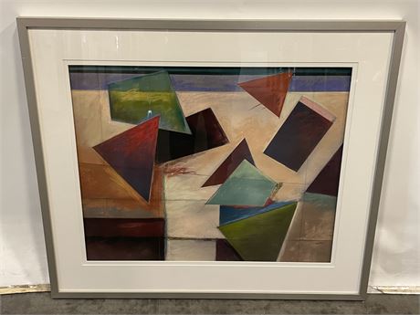 Abstract blue, black, red, green geometric shapes, tan background art painting with chrome metal frame and white mat. Signed by Hefti
